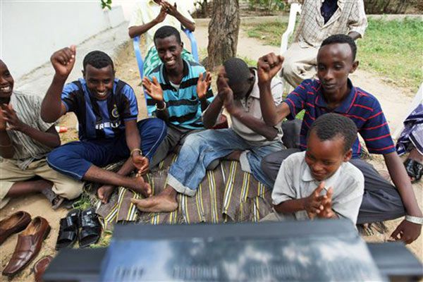 Somalians in Mogadishu react after President Obama quotes the Koran.